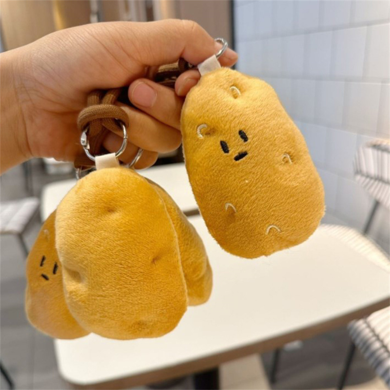 ของตกแต่งแขวนรูปมันฝรั่งยัดไส้ - Gaming Console Keychain บทวิจารณ์และราคา